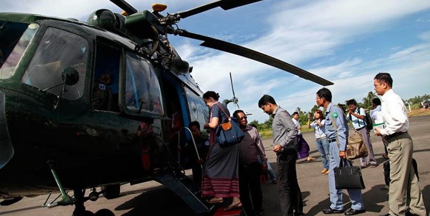 Renata Lok-Dessallien (left), United Nations Resident and Humanitarian Coordinator and UNDP Resident Representative in Myanmar, boards a military helicopter with diplomats on board to take off for a trip to Maungdaw town's fighting area at the Sittwe airport in Sittwe, Rakhine State, western Myanmar, 3 November. Foreign diplomats led by Renata, visit Sittwe and Maungdaw conflict area on 02 November and 03 November 2016 for the Human Rights accusations to the Muslims. Photo: Nyunt Win/EPA