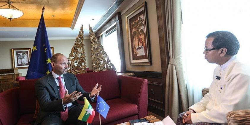 EU Ambassador Roland Kobia, left, discusses the EU-Myanmar programme with Mizzima Editor in Chief Soe Myint, right. Photo: Hong Sar/Mizzima