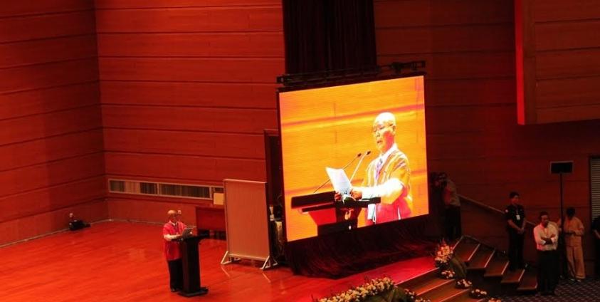 General Mutu Say Poe talks at the ceremony to celebrate the first anniversary of the NCA signing