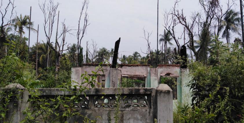 တင်းမကျေးရွာမှ မီးလောင်ပျက်စီးသွားသည့် နေအိမ်များကို ၂၀၁၉ ခုနှစ်အတွင်းက တွေ့ရစဉ်။