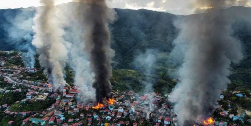 Houses ablaze in Thantlang Township, Chin State, as a result of Military Council artillery bombardment in October 2021