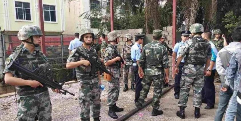 မူစယ်မြို့ ဆင်ဖြူစျေးကော်မတီရုံးဆောက်လုပ်နေမှု လက်နက်အပြည့်အစုံဖြင့်တရုတ်တပ်ဖွဲ့များ ၀င်ရောက်ဟန့်တား (photo/Myo Gyi)