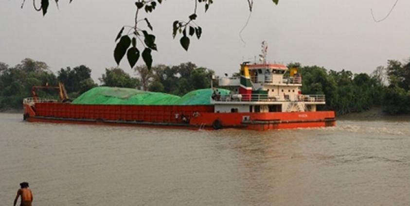 Ship carrying coal up Attaran River (Photo: MNA)