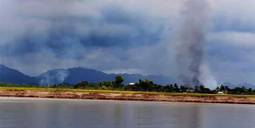 Smoke rises from Sein Nyin Pya village in Buthidaung township on 30 August 2017. Photo: Ko Wai Hin Aung