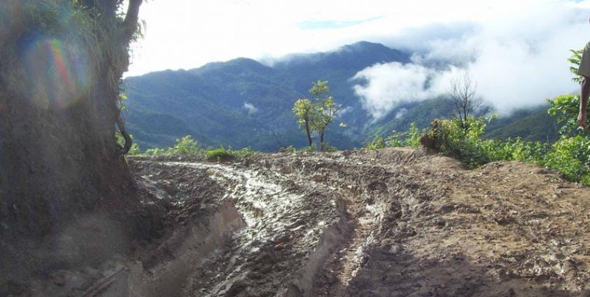 A muddy road near Tedim winds through the hills of Chin State. Photo: Mizzima