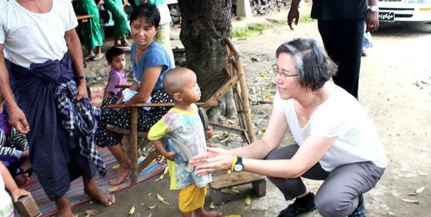 The UN is concerned about the continued displacement of people by fighting, among other concerns. UN Special Rapporteur Yanghee Lee, right, seen here on a recent visit to Zion Baptist IDP camp at Myitkyina Kachin State. Photo: UNIC Yangon