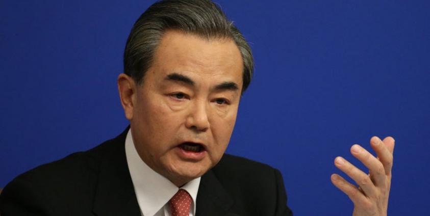 Chinese Foreign Minister Wang Yi gestures as he answers a question from a reporter during a press conference on the sidelines of the fourth session of the 12th National People's Congress (NPC) in Beijing, China, 08 March 2016. Photo: How Hwee Young/EPA