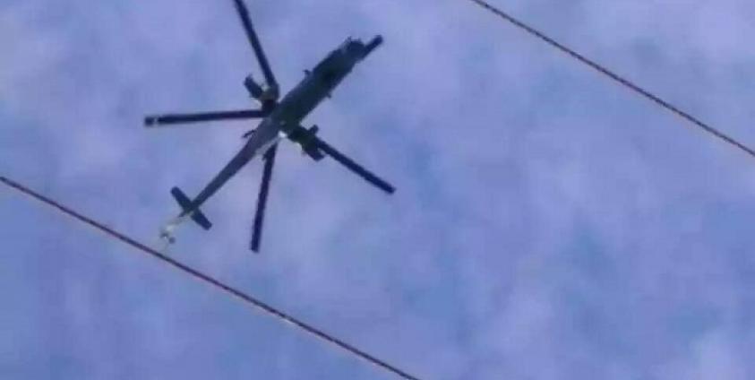 A Burma Army helicopter flies over Wan Hai, Kesi Township. (Photo: Zanhok Hengjai / Facebook)