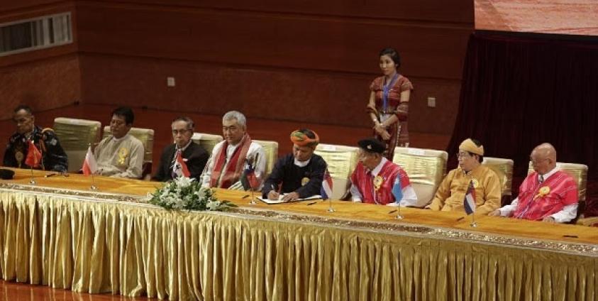 Leaders of eight ethnic armed organisations at the signing of the Nationwide Ceasefire Accord (NCA) in Naypyidaw on 15 October.