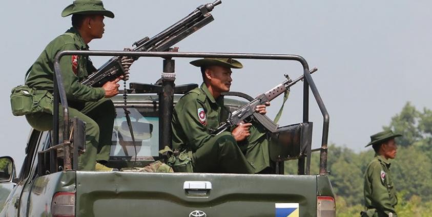 Heavily armed Myanmar army troops patrol Kyinkanpyin area in Maungdaw town located in Rakhine near the Bangladesh border on October 16, 2016. Photo: Khine Htoo Mrat/AFP