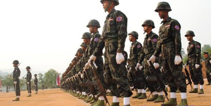 Soldiers from the Arakan Army line up for a drill