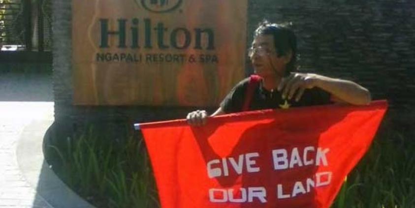 Ko Soe Wai Protesting outside the Hilton Hotel in Ngapali