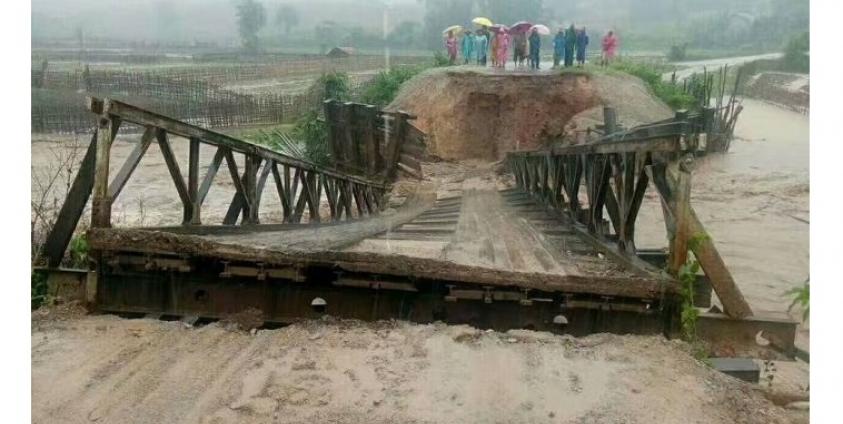 မိုးသည်းရေကြီးမှုကြောင့် နမ္မတူမြို့နယ်အတွင်းနေအိမ်များရေလွှမ်း တံတားတစင်းကျိုးကျပျက်စီး (photo/Numtu Youth)