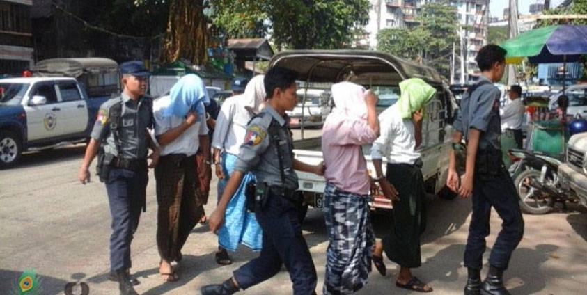 The accused in the Rohingya calendar case appear for the third time at Yangon’s Pazundaung Township Court on 16 December 2015. Photo: Zaw Kham Hein/Mizzima