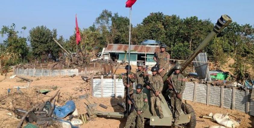 AA troops celebrating after capturing Taungshay hill tactical operation command near Tinma village, Kyauktaw Township