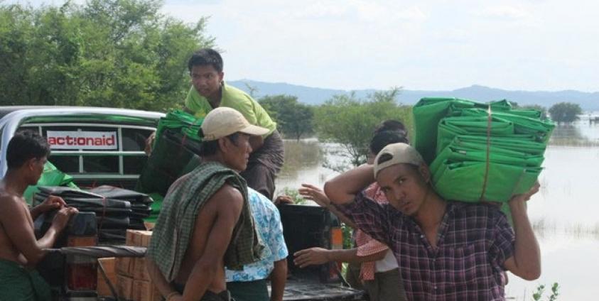 Distribution of tarpaulins at Kyun Kalay Village, Pakokku Township on 7 August 2015. Photo: ActionAid
