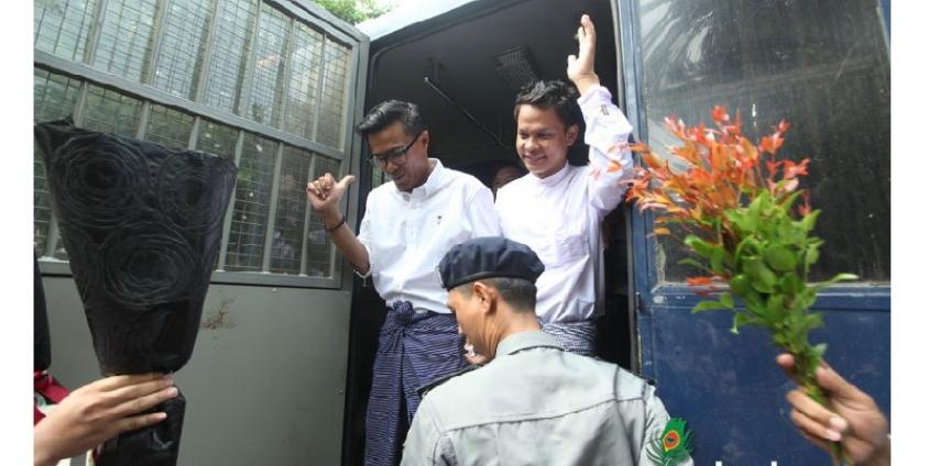 Detained journalists from Eleven media, editor in chief Kyaw Zaw Linn (L), chief reporter Phyo Wai Win (C) and managing editor Nari Min (back), arrive in Tamwe township court for their trial in Yangon on 17 October 2018. Photo: Thura/Mizzima