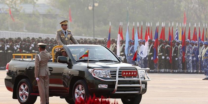 Myanmar Senior General Min Aung Hlaing inspects troops during a parade commemorating the 72nd Armed Forces Day in Naypyitaw, Myanmar, 27 March 2017. Photo: Hein Htet/EPA