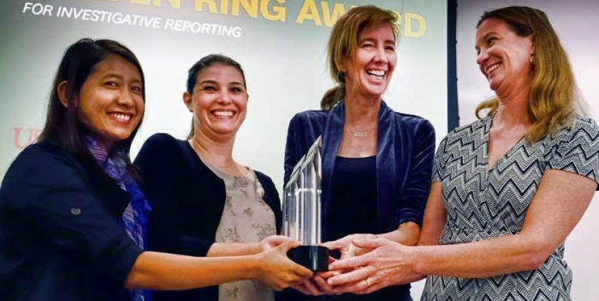 Left to right: AP’s Esther Htusan, Margie Mason, Robin McDowell and Martha Mendoza receive the Selden Ring Award for Investigative Reporting from USC Annenberg in Los Angeles on Friday, April 15, 2016.