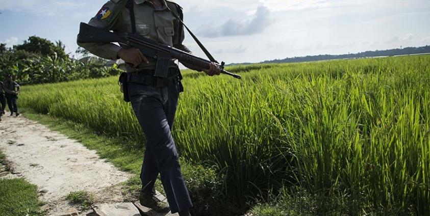 Armed police conduct search operations at Warpait village in Maungdaw, located in Rakhine State, on October 14, 2016 as the government announced that terror groups were behind the series of attacks. Photo: Ye Aung Thu/AFP