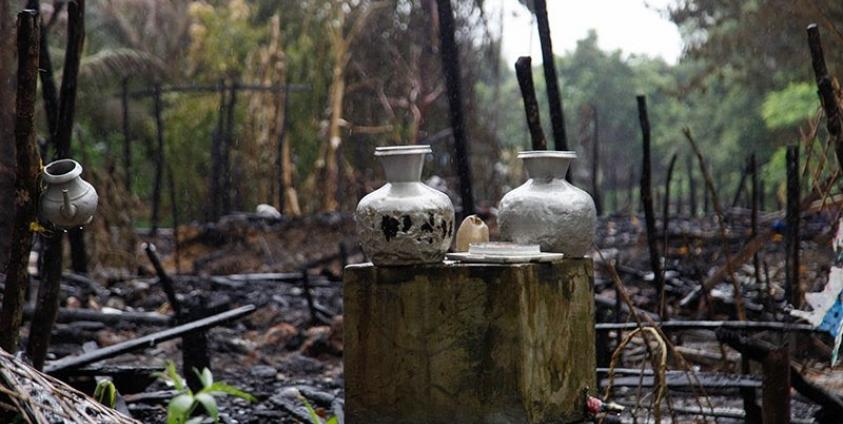 The burnt down area after attackers leave Wa Beik village near Maungdaw town of Bangladesh-Myanmar border, Rakhine State, western Myanmar, 13 October 2016. Photo: Nyunt Win/EPA