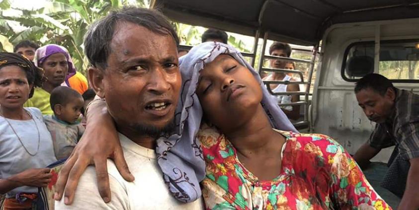 An injured Muslim woman being brought to hospital. (Photo: Ann Thargyi)