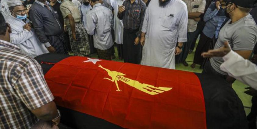 Relatives and friends of National League for Democracy member Khin Maung Latt, react during his funeral service in Muslim tradition held by the members of National League for Democracy (NLD) party in Yangon, Myanmar, 07 March 2021. Photo: EPA