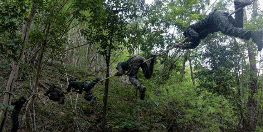 This undated photo taken in May 2021 shows anti-coup activists undergo basic military training at the camp of Karen National Union (KNU), an ethnic rebel group in Karen State after people fled major Myanmar cities due to military crackdown and sought refuge in rebel territories. Photo: AFP