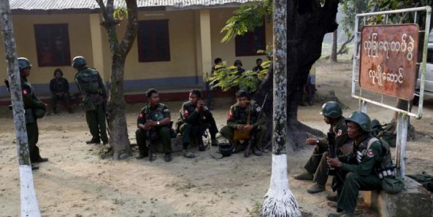 Myanmar soldiers relax inside the Kyee Ken Pyin police border guard post near Maungdaw town of Bangladesh-Myanmar border, Rakhine State. Photo: Nyein Chan Naing/EPA