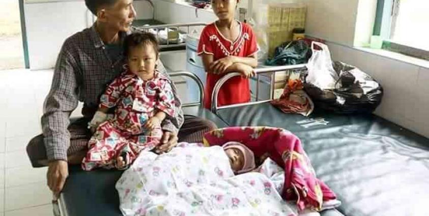 ဆေးကြောင်ဖခင်မှလိုက်ခုတ်သဖြင့် ဒဏ်ရာရသောသမီးလေး ဆေးရုံရောက် ။ အဖိုးနှင့်မြေးမ များပုံ။ Photo: Citizen Journalist