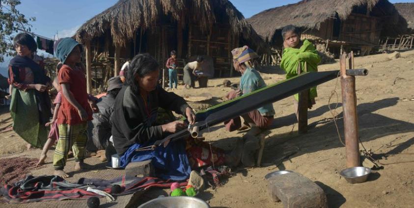 A Naga tirbeswoman weaving cloth in Lahal township, in the remote Sagaing region. Photo: Phyo Hein Kyaw/AFP