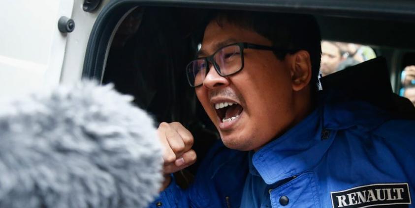 Reuters' journalist Wa Lone shouts as he leaves after his trial at Mingaladon township court in Yangon, Myanmar, 27 December 2017. Photo: Lynn Bo Bo/EPA-EFE
