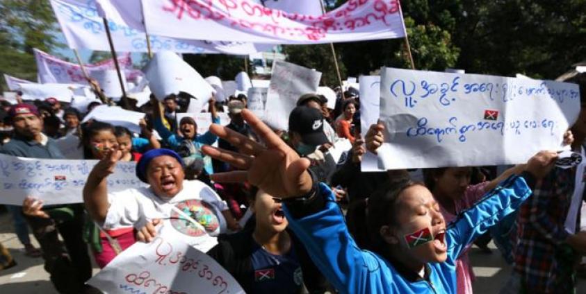Demonstrators march in support of three local activists jailed by authorities during a rally in Myitkyina, capital of restive Kachin state on December 11, 2018. Photo: Zau Ring Hpra/AFP