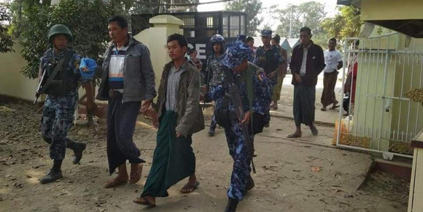 (ဖမ်းဆီးခံနေရသည့် သရက်ပြင် ကျေးရွာအုပ်ချုပ်ရေးမှူးနှင့် ကျေးရွာသားတစ်ဦးကို တွေ့ရစဉ်)