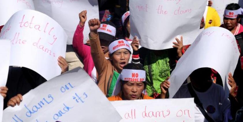 People from Kachin State shout slogans and hold placards during a protest held to show opposition to the Irrawaddy Myitsone Dam project in Myitkyina, Kachin State, Myanmar, 07 February 2019. Photo: Si Thu MKN