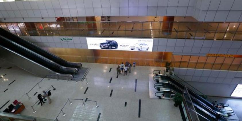 People stand in the departure lounge at the Yangon International Airport in Yangon, Myanmar, Myanmar, 18 March 2020. Photo: EPA