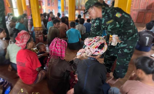 ဓာတ်ပုံ - (RCSS ထံ ဘက်ပြောင်းခိုလှုံလာသည့် PNLA တပ်ဖွဲ့ဝင်နှင့် မိသားစုဝင်များ / Tai Freedom)
