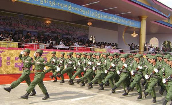 Photo by SHAN- The United Wa State Army (UWSA) soldiers march on the 20th anniversary in the Headquater Pangsang in 2009Photo by SHAN
