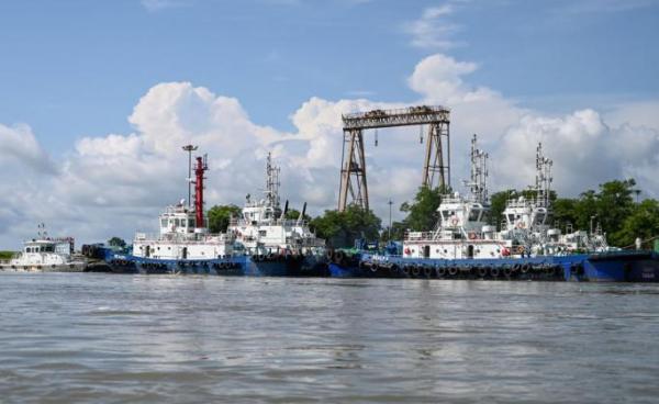 This photo taken from a boat on October 2, 2019 shows vessels docked at a port of a Chinese-owned oil refinery plant on Made Island off Kyaukphyu, Rakhine State. Photo: Ye Aung Thu/AFP