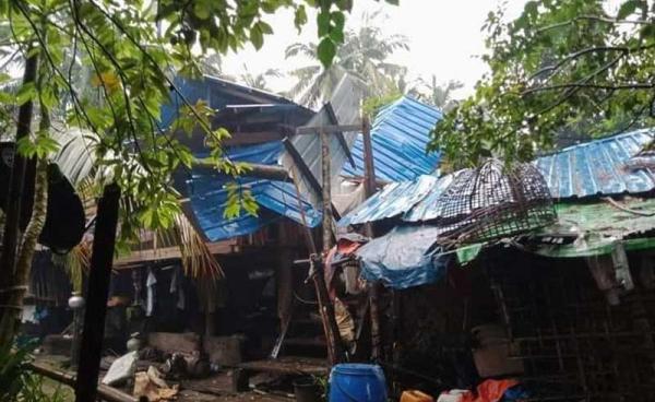 Homes damaged by strong winds in Ngapali’s Jeittaw ward. (Photo: Yebaw Thaung Tun)