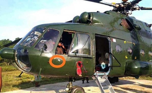 A military helicopter flying to rescue detained Tatmadaw troops and civilians from the Shwe Nadi ferry was shot by Arakan Army soldiers on 26 October 2019. (Photo: Tatmadaw)