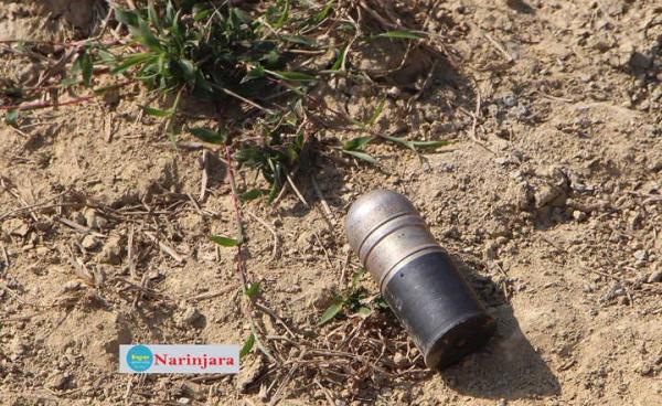 ဇန်နဝါရီ ၃၀ ရက်နေ့က ရိုက်ယူခဲ့သည့် အုန်းချောင်းရွာဝင်၀ လမ်းဘေးရေမြောင်းတွင် မပေါက်ကွဲဘဲ ကျန်နေသည့် လက်နက်ကြီးကျည်နှင့် ပျက်စီးသွားသည့် ဓမ္မာရုံ