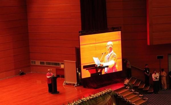 General Mutu Say Poe talks at the ceremony to celebrate the first anniversary of the NCA signing