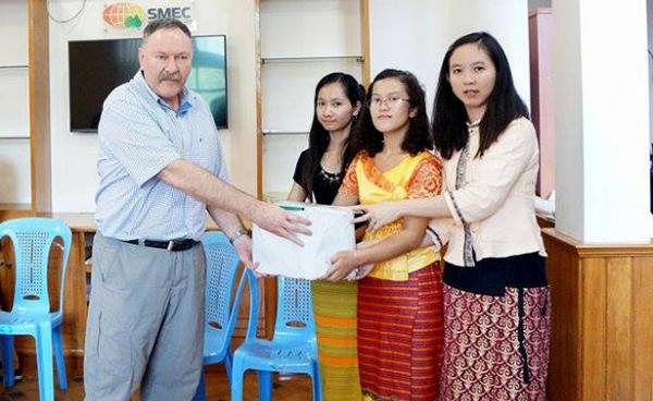 Representatives from the Shan community present a petition opposing the Mongton Dam to SMEC at their office in Yangon on 25 August 2015. (Photo by Action for Shan State Rivers)