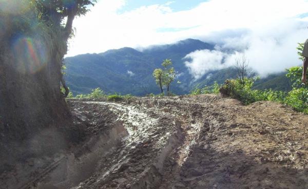 A muddy road near Tedim winds through the hills of Chin State. Photo: Mizzima
