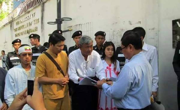 Burma’s embassy representatives handling documents containing requests (Photo: TACDB)