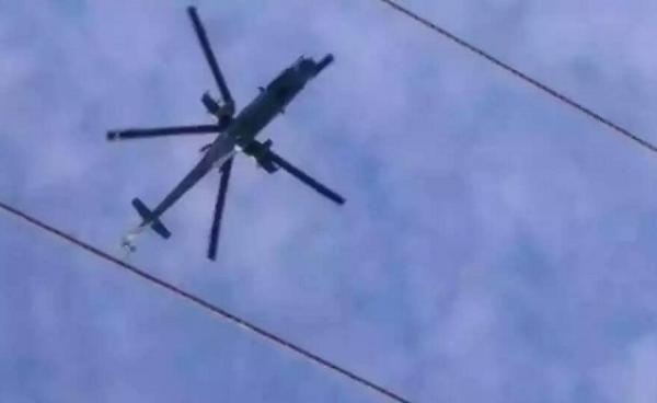 A Burma Army helicopter flies over Wan Hai, Kesi Township. (Photo: Zanhok Hengjai / Facebook)