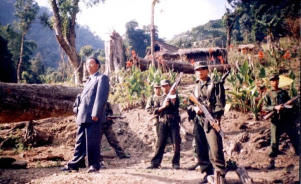 Khaplang at his den flanked by his bodyguards. Photo: samir kar purkayastha/PCDN
