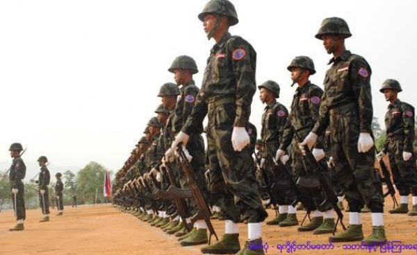 Soldiers from the Arakan Army line up for a drill
