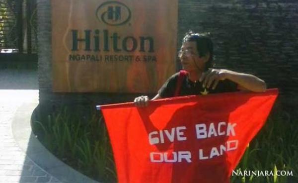 Ko Soe Wai Protesting outside the Hilton Hotel in Ngapali